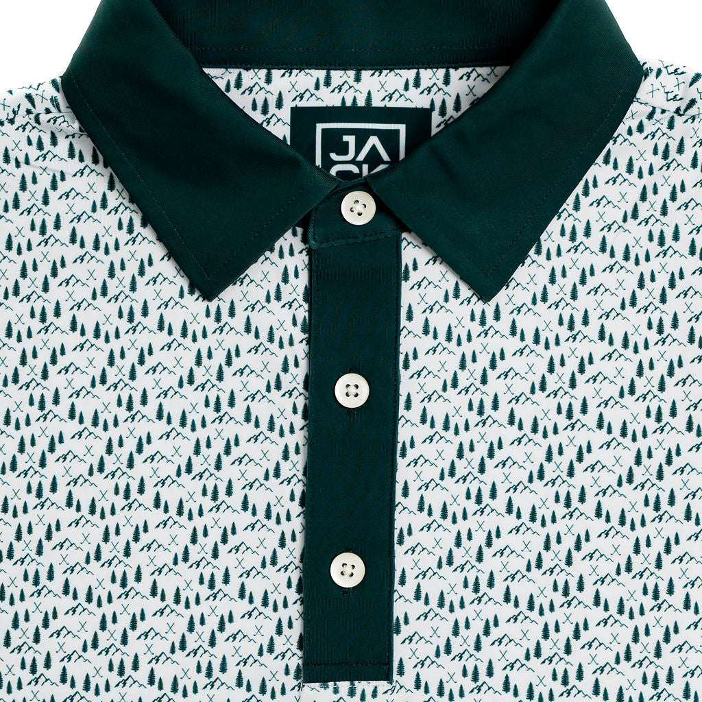 Polo shirt with a patterned design and green collar on a white background
