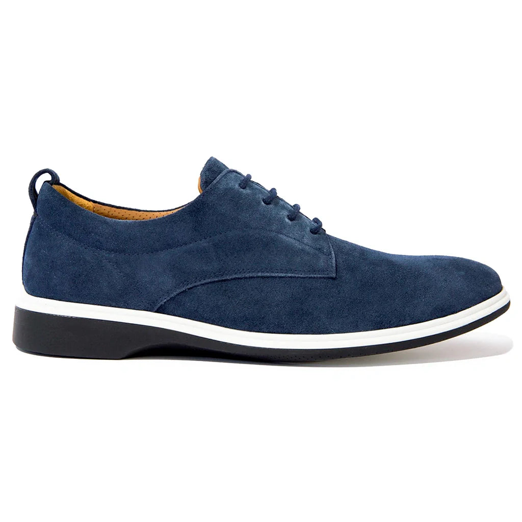 Blue suede shoe with a white sole on a white background