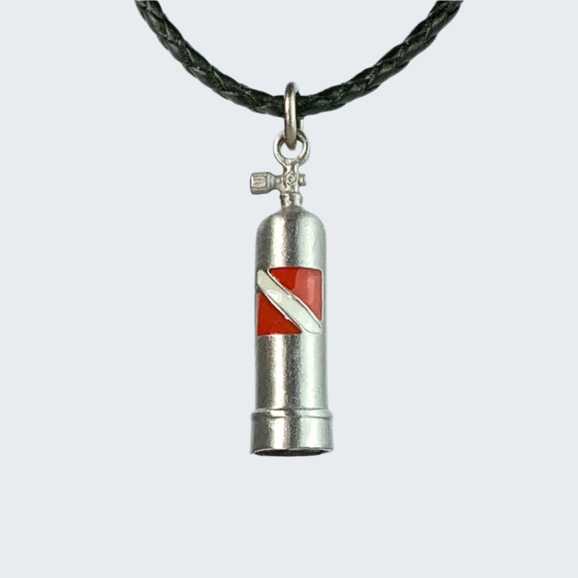 Silver diving cylinder pendant with red and white design on a blue water background
