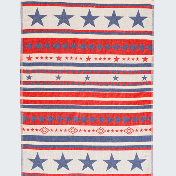 Towel with red, white, and blue pattern featuring stars and stripes on a white background