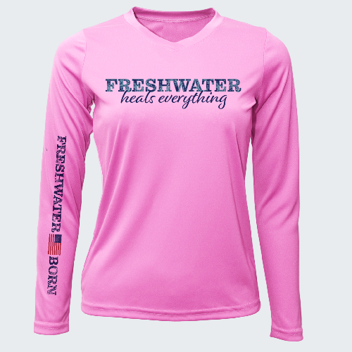 Pink long-sleeve shirt with 'Freshwater heals everything' text on a white background