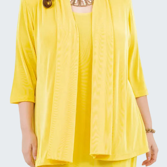 Woman wearing a yellow outfit with a matching jacket on a white background