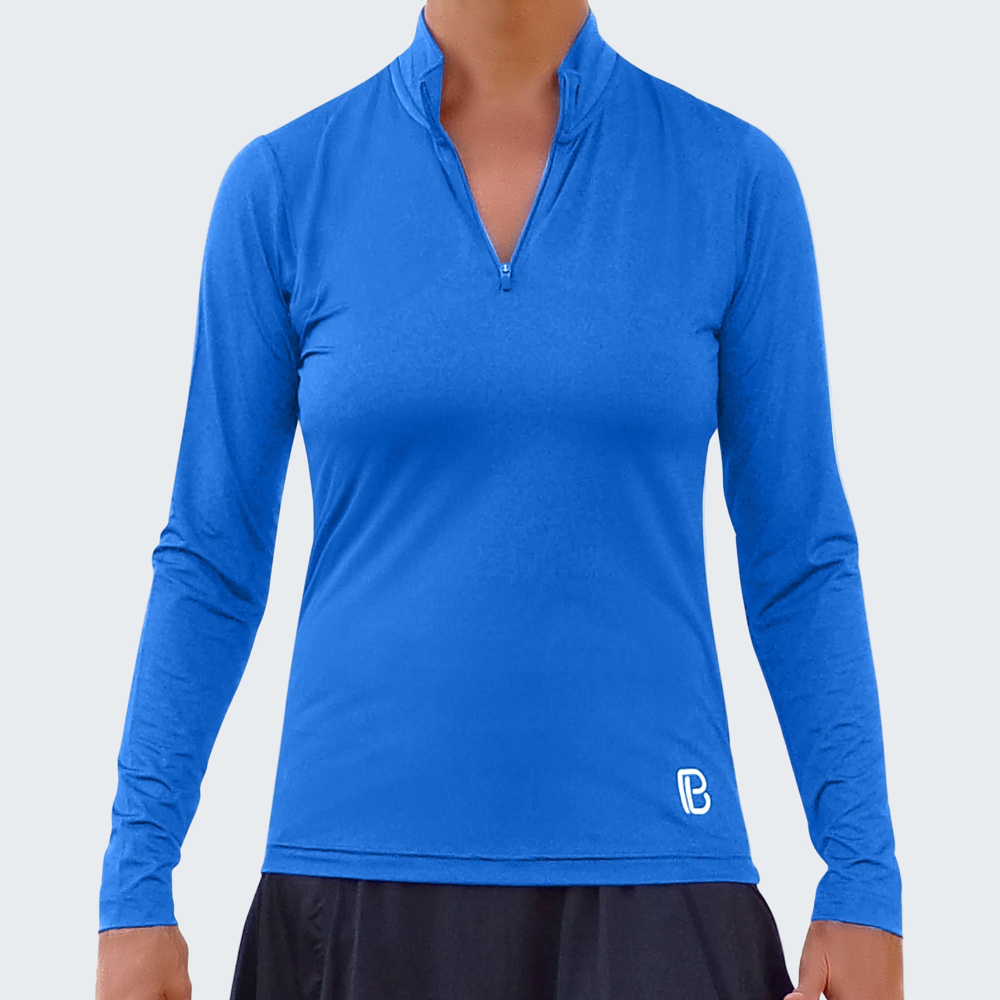 Blue long-sleeve athletic top with a small logo on a white background