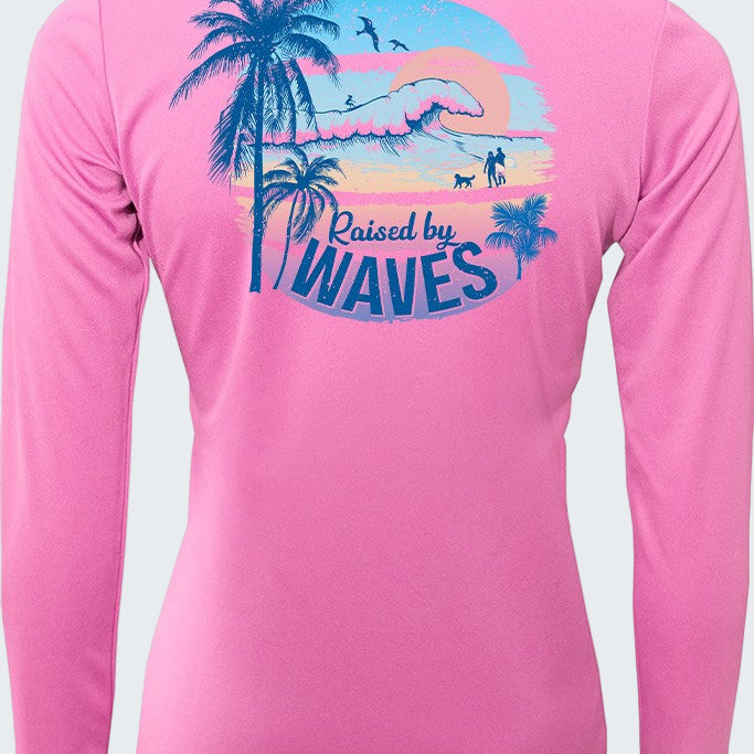 Pink long-sleeve shirt with a tropical graphic on the back against a white background