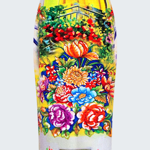 Colorful skirt with floral and landscape design on a white background