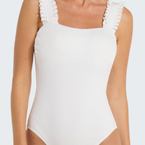 White one-piece swimsuit with ruffled straps on a white background