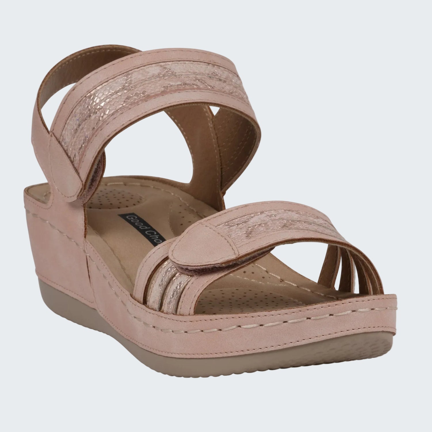 Pink wedge sandal on a white background