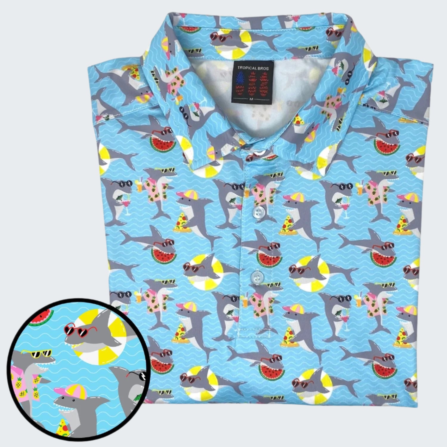 Children's shirt with shark pattern on a blue background