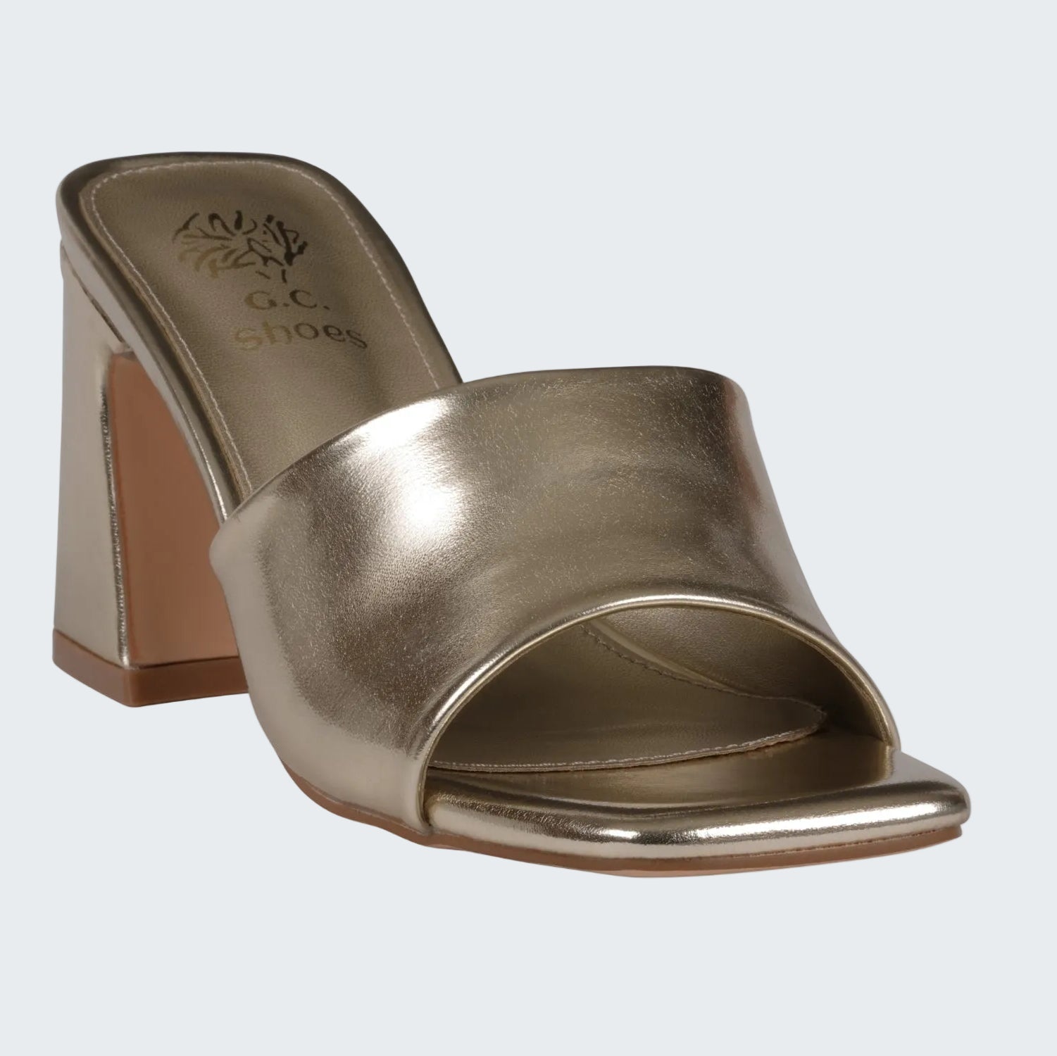 Metallic high-heeled sandal on a white background