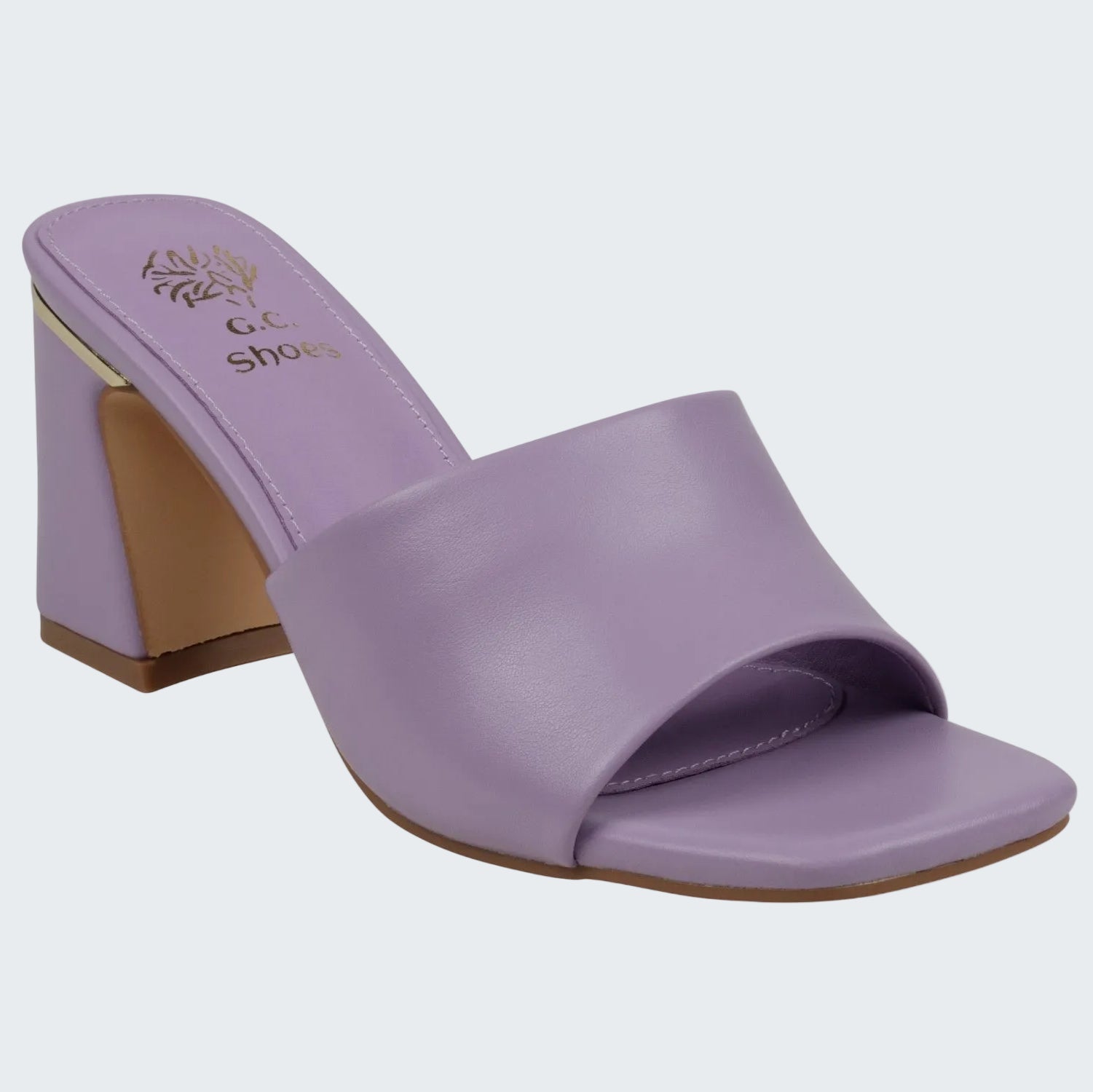 Purple sandal with a brown heel on a white background
