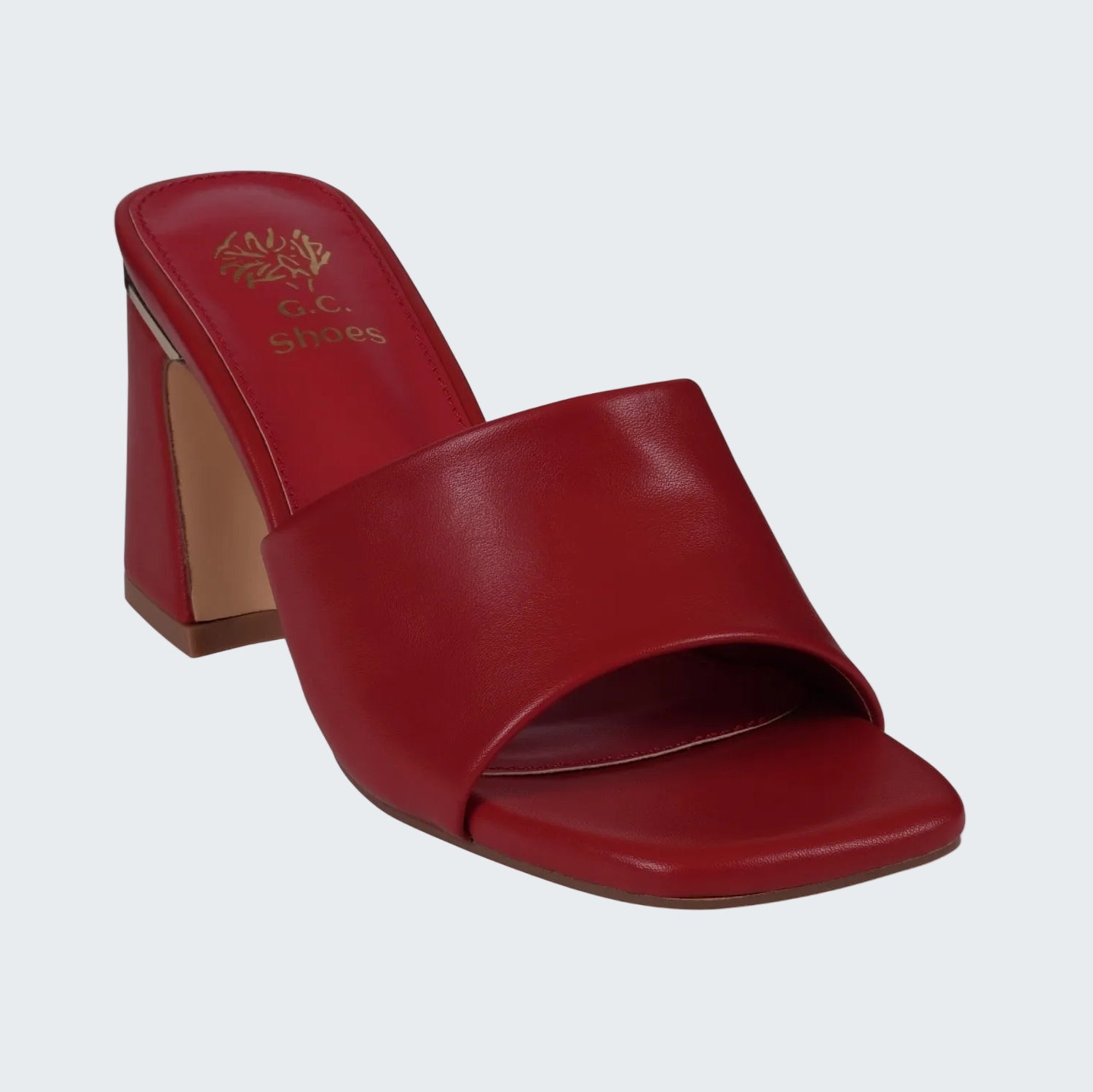 Red sandal with a high heel on a white background