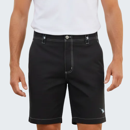 Person wearing black shorts with a brand logo on a white background