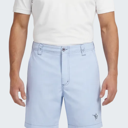 Person wearing light blue shorts and a white polo shirt on a white background