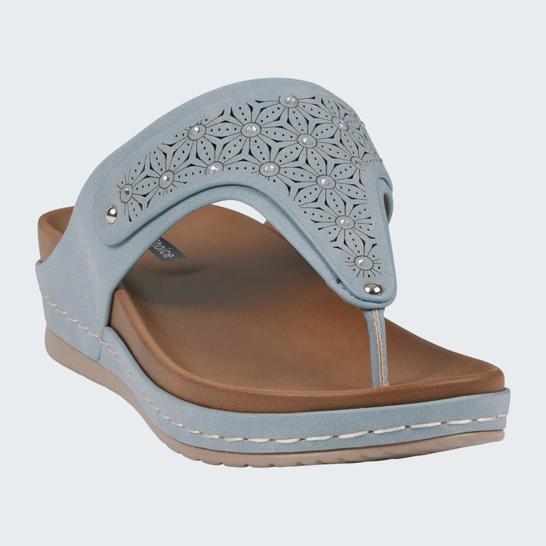 Blue sandal with decorative straps and brown sole on a white background