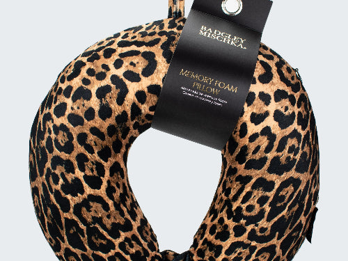 Leopard print memory foam pillow with a visible brand tag on a white background