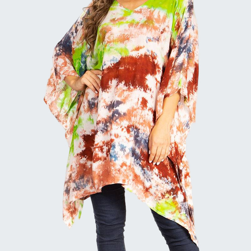 Colorful tie-dye kimono-style top worn by a person on a white background