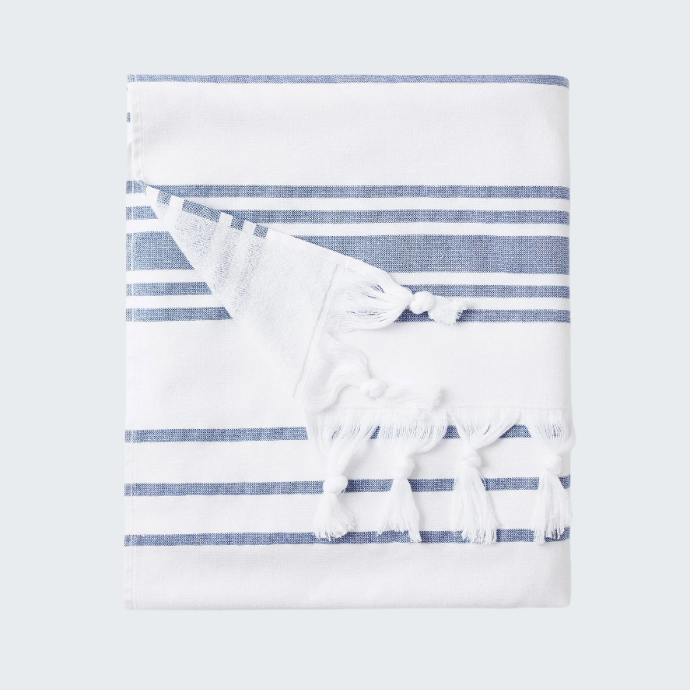Striped towel with a bow on a white background