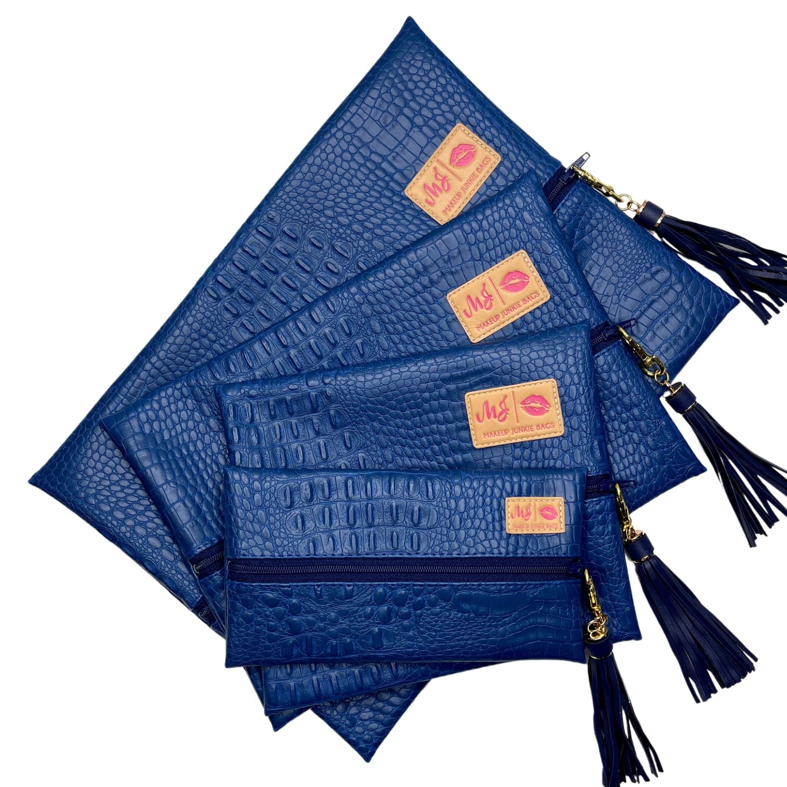 Set of blue clutch bags with tassels on a white background