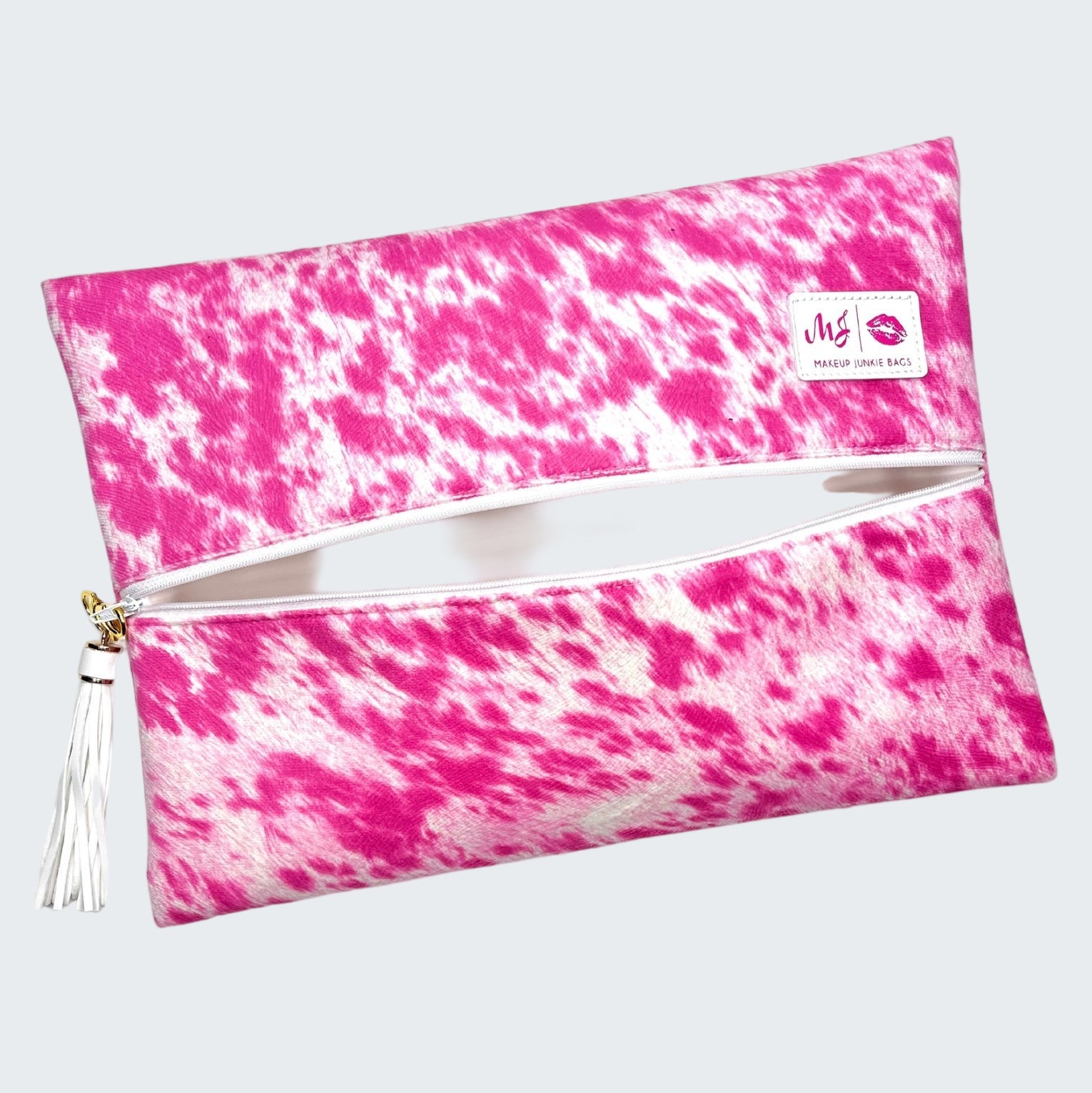 Pink and white tie-dye pouch with a visible brand logo on a white background
