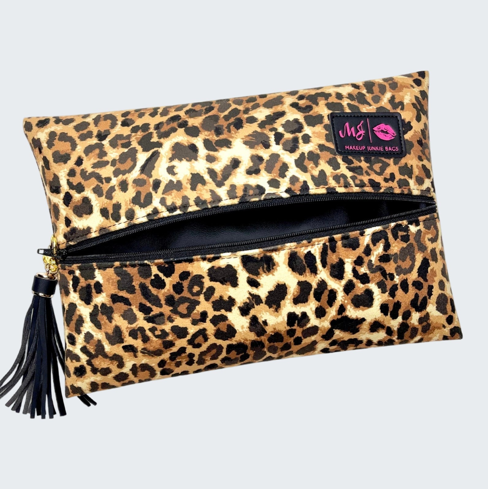 Leopard print makeup bag with a visible brand logo on a white background