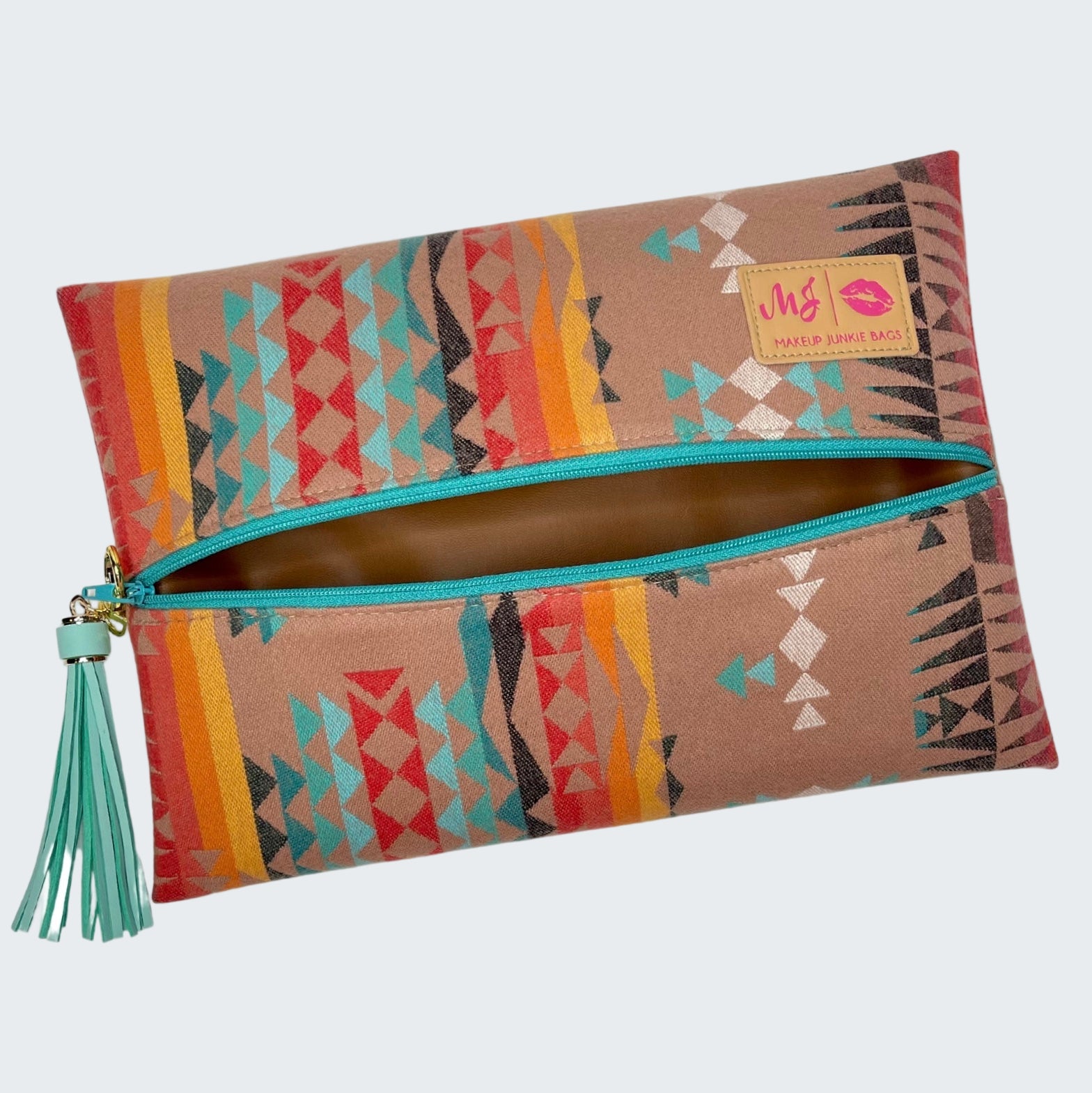 Colorful patterned pouch with a tassel on a white background