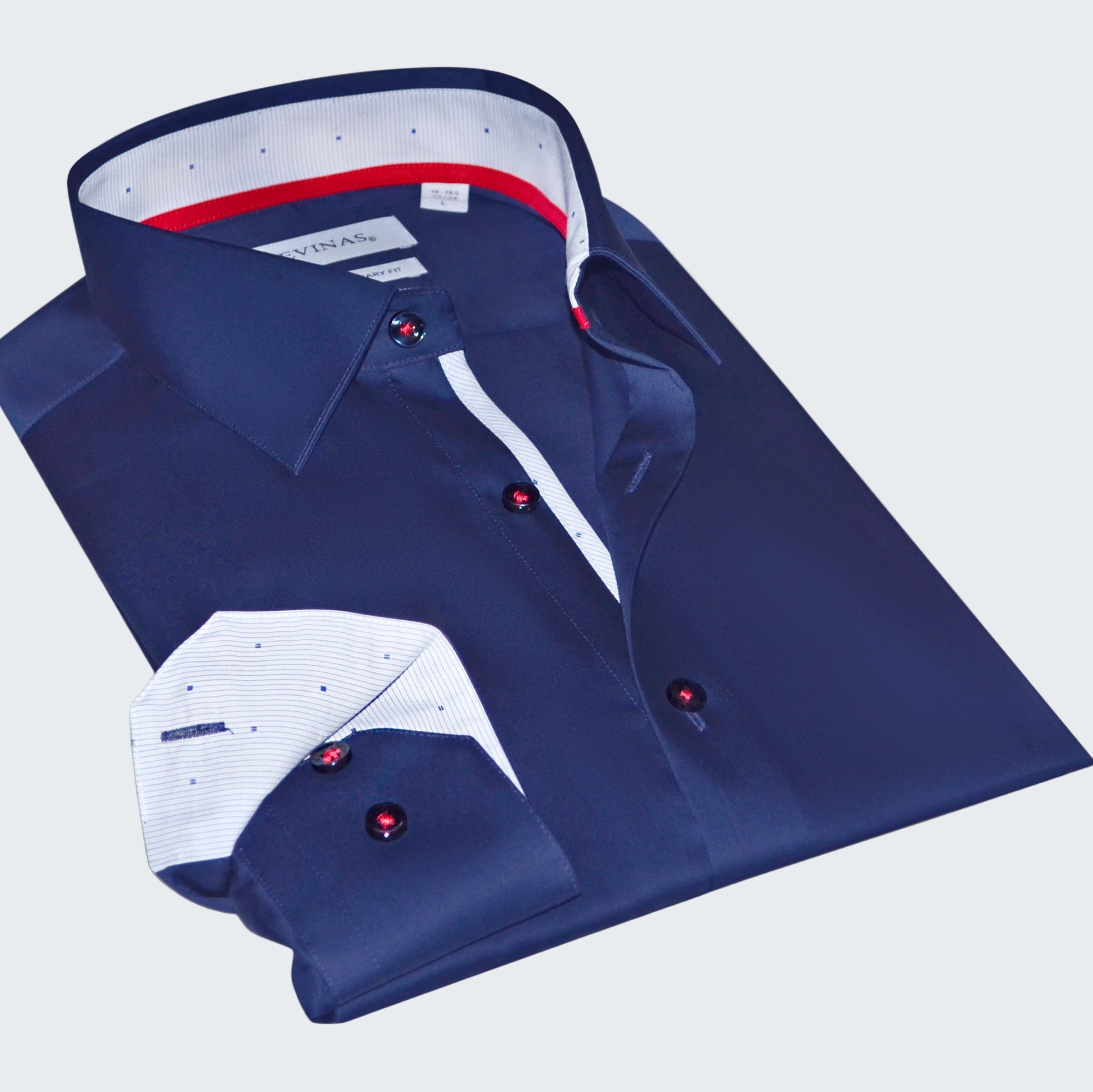 Folded blue dress shirt with white interior on a white background