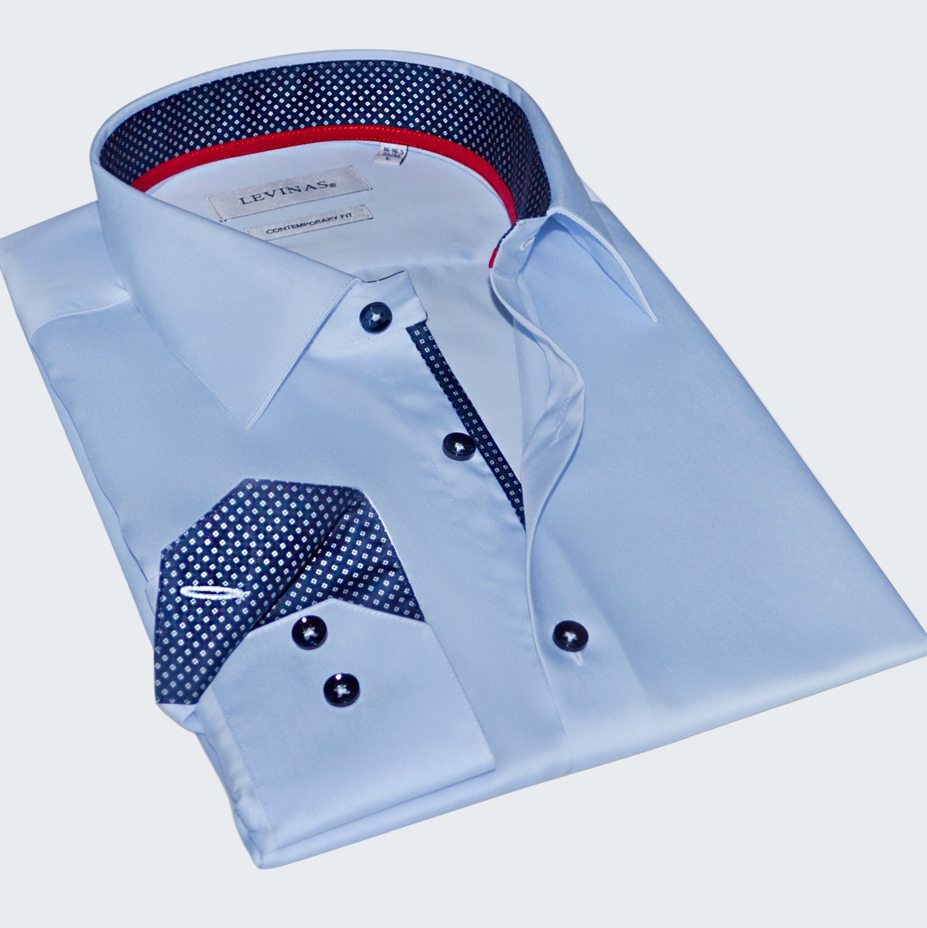 Light blue dress shirt with patterned collar and cuffs on a white background