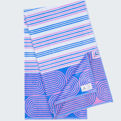 Striped towel with blue and pink patterns on a white background
