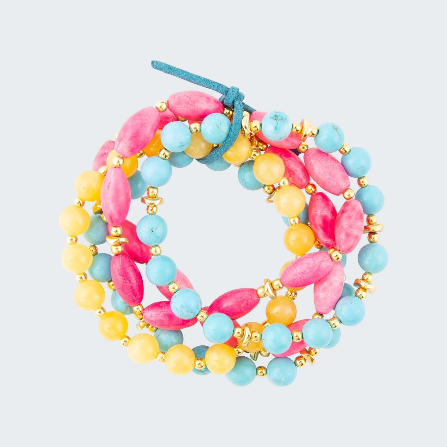 Colorful beaded bracelet with pink, yellow, and blue beads on a white background