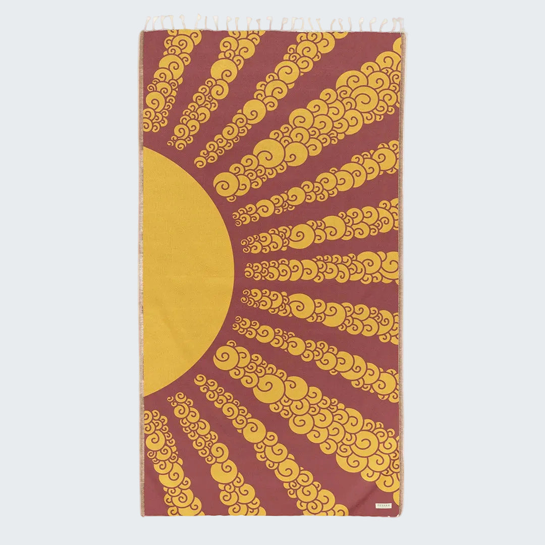 Yoga mat with yellow wave pattern on a red background