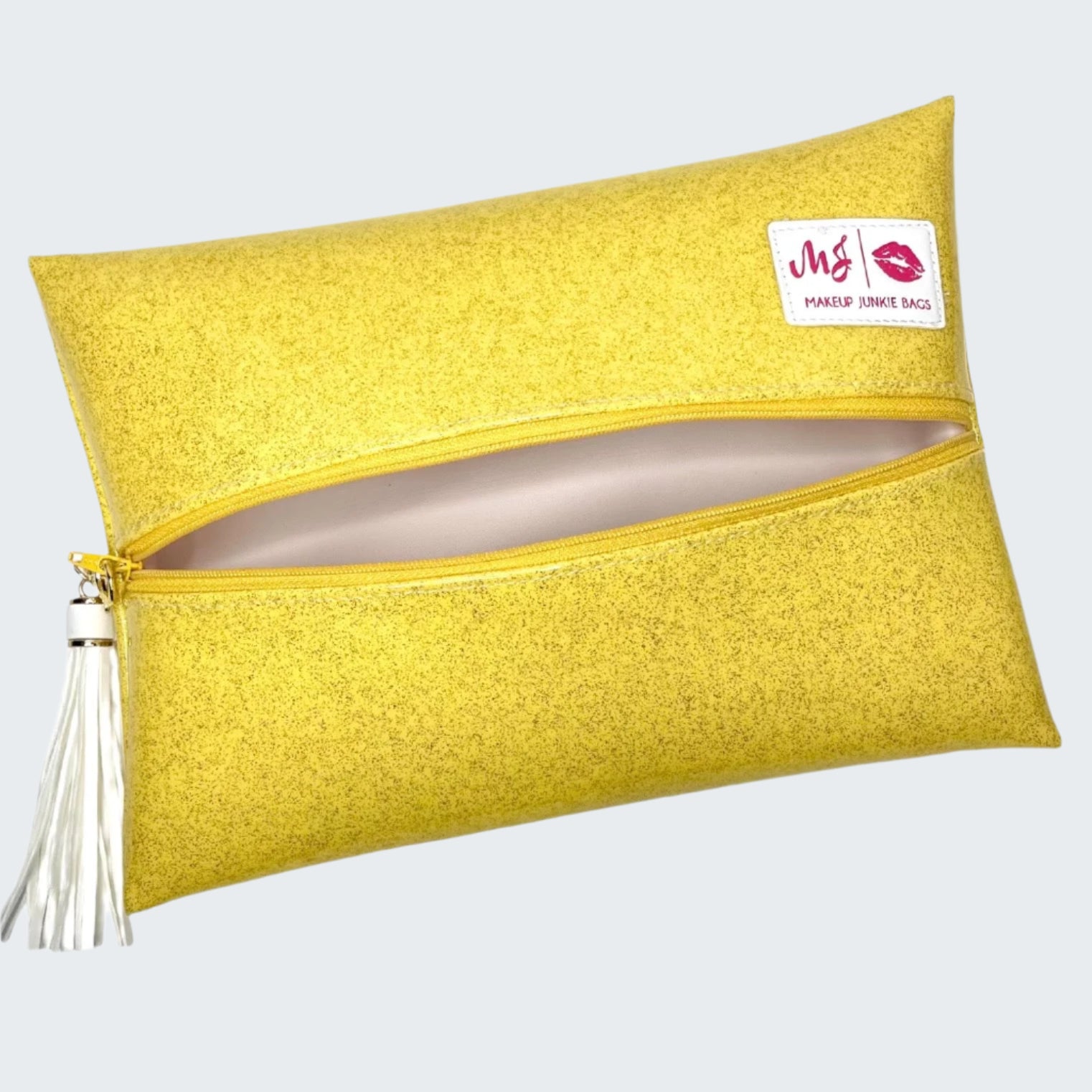 Yellow clutch bag with a visible brand logo on a white background