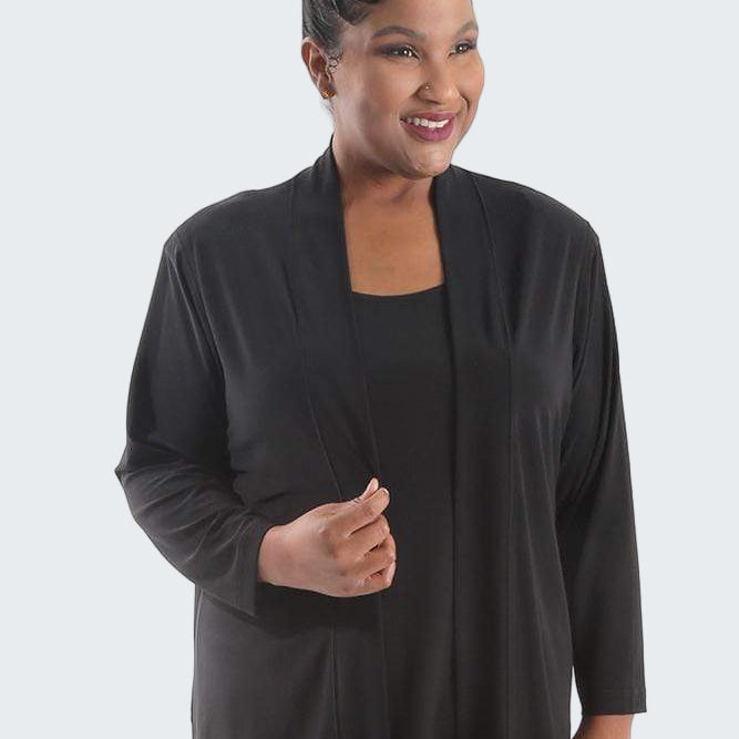 Woman wearing a black cardigan on a white background