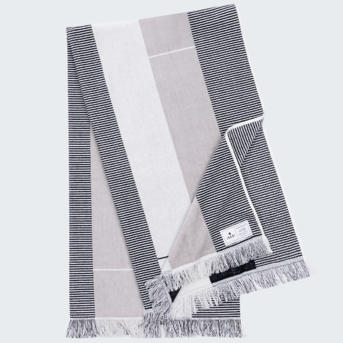 Set of three striped scarves in gray, white, and black on a white background