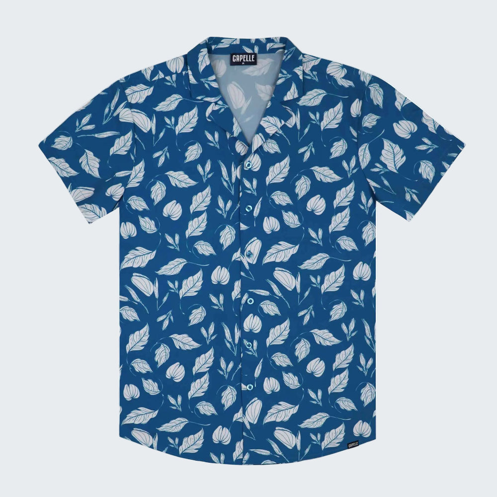 Blue shirt with white leaf pattern on a white background
