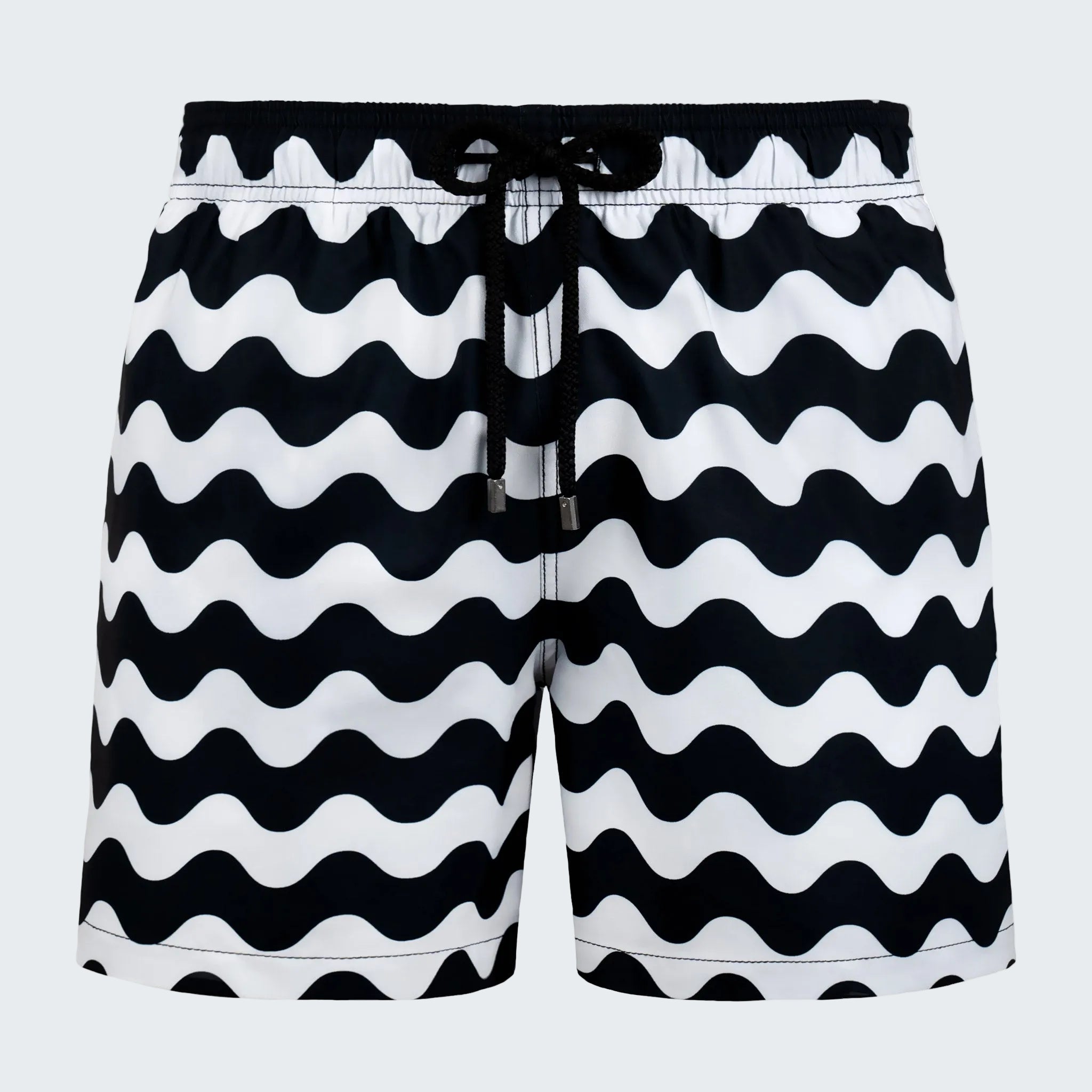 Black and white wavy patterned shorts on a white background