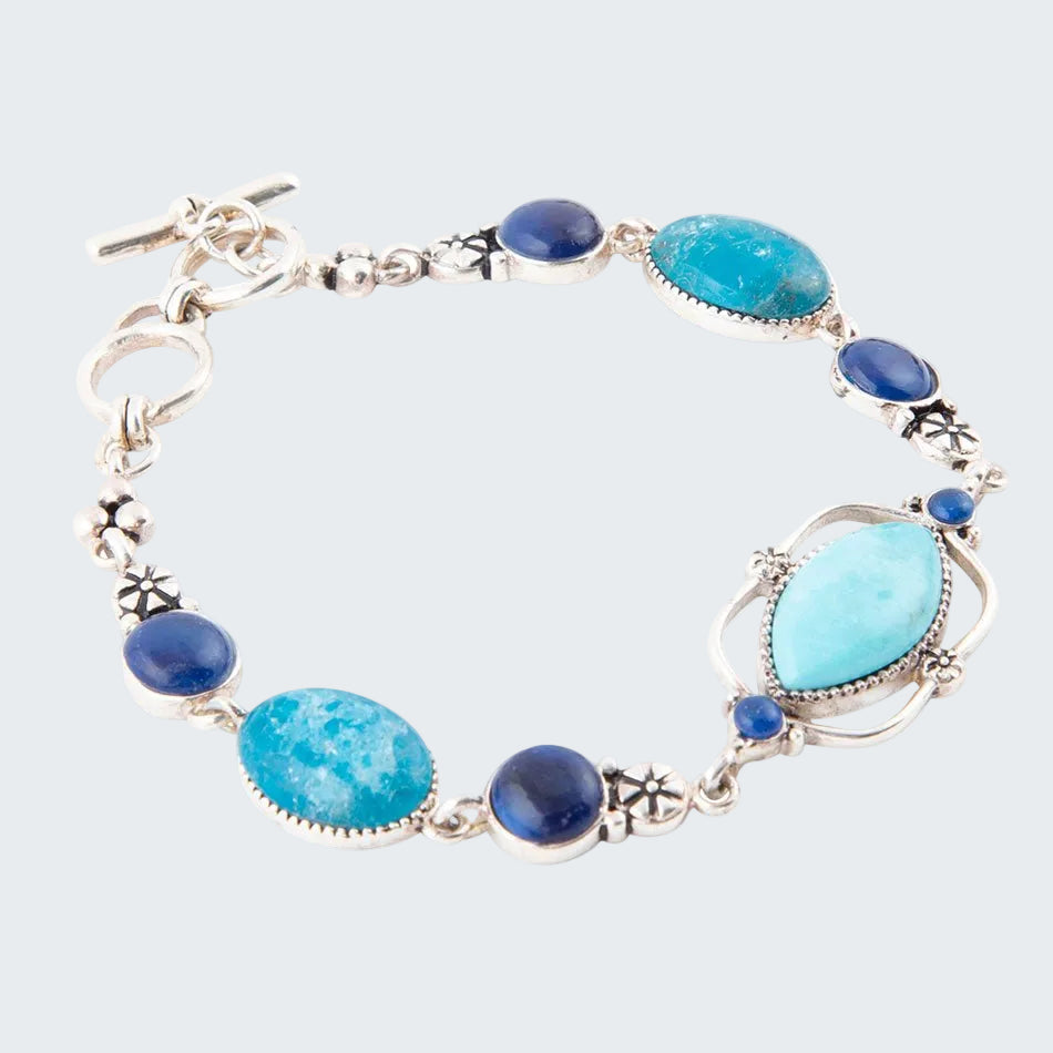 Bracelet with blue and silver design on a white background