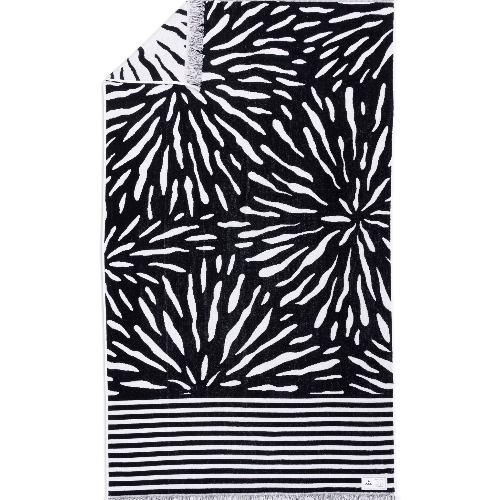 Black and white patterned towel with stripes on a white background