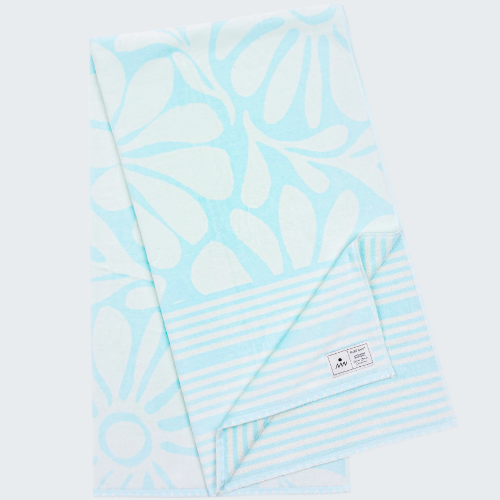 Light blue patterned towel with stripes on a white background