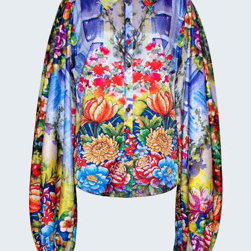 Colorful floral blouse on a white background