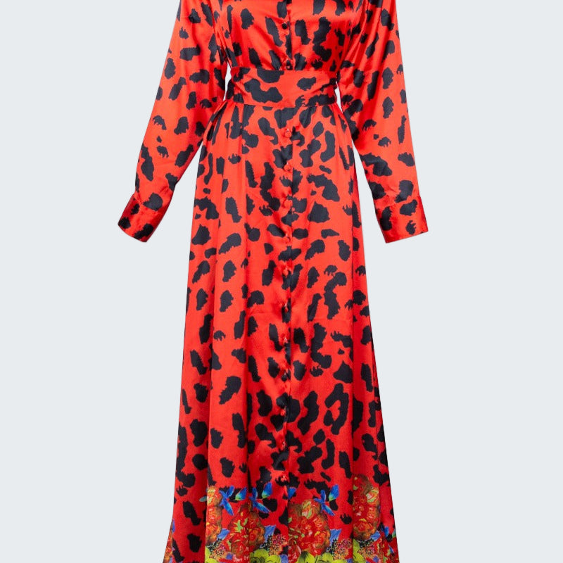 Red dress with black leopard print and colorful floral bottom on a white background