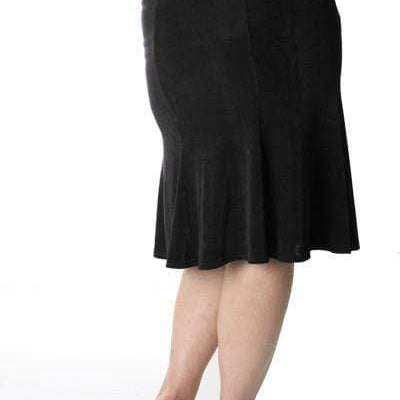 Black skirt worn by a person on a white background