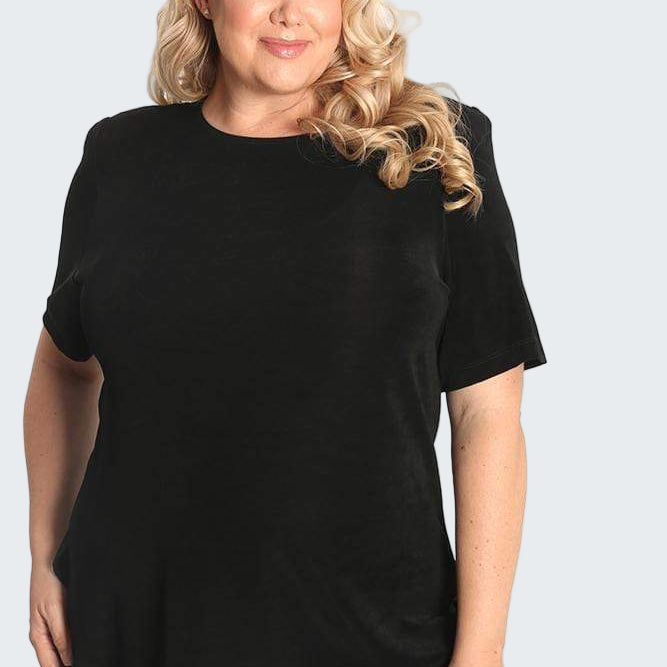 Woman wearing a black t-shirt against a white background