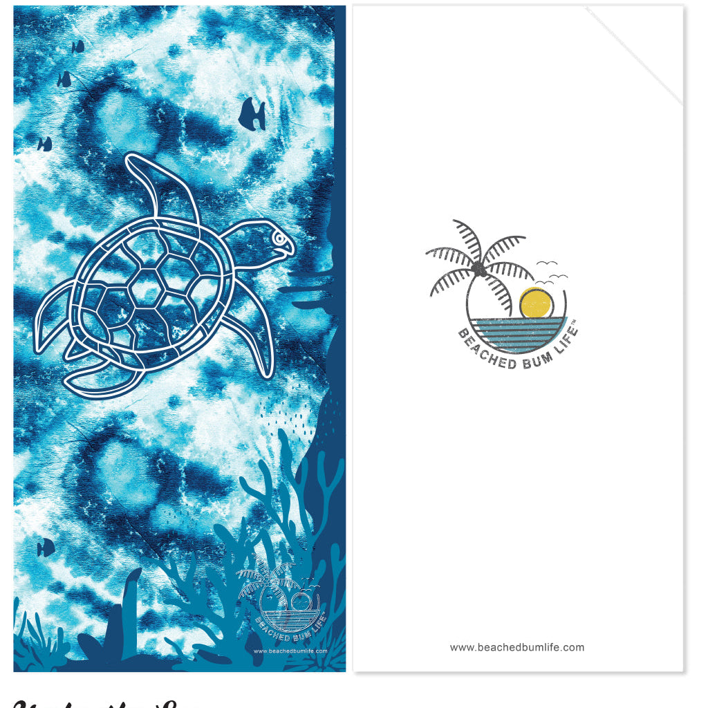 Towel with turtle design and 'Beached Bum Life' logo on a white background