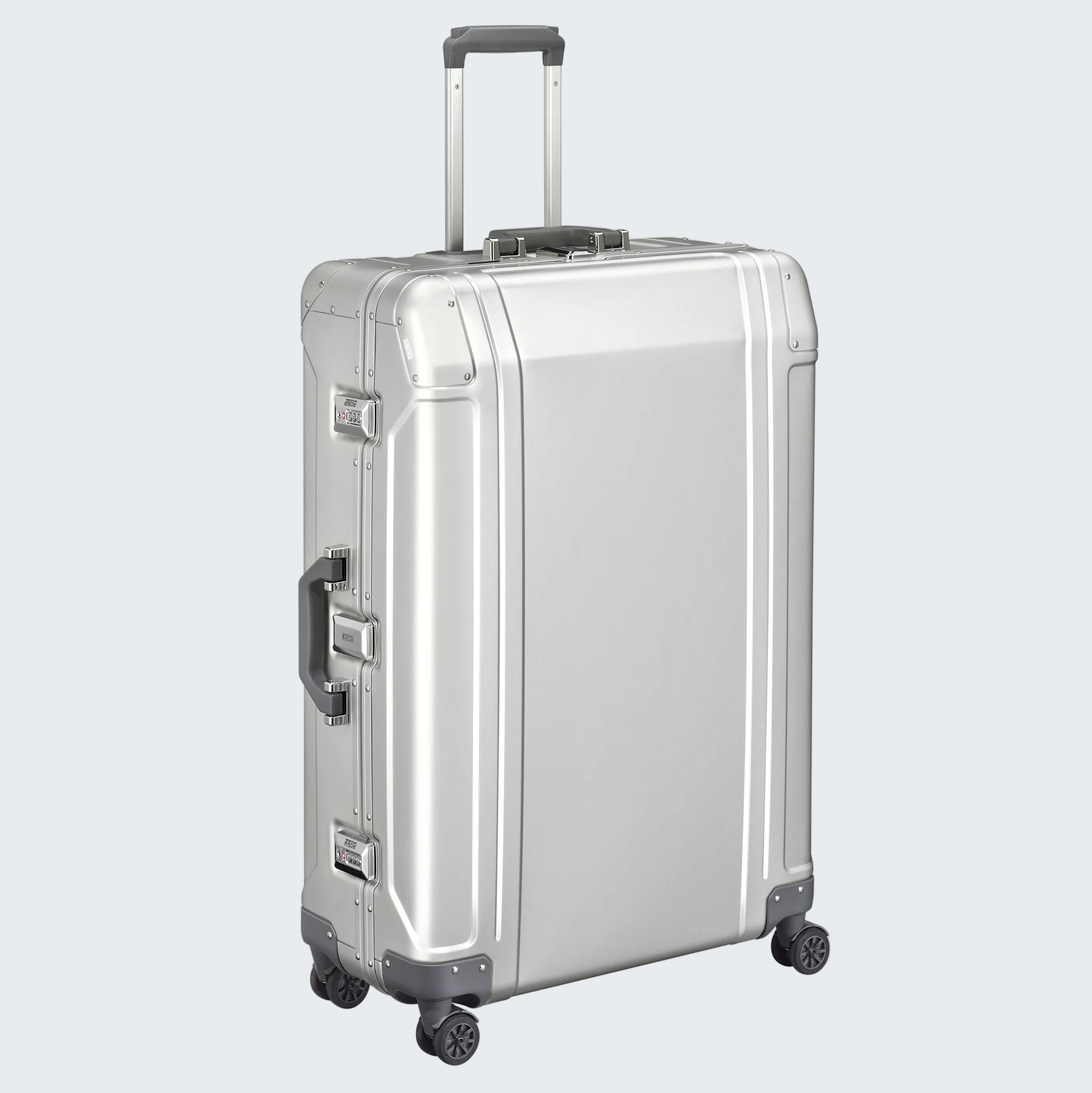 Silver suitcase with wheels and handle on a white background