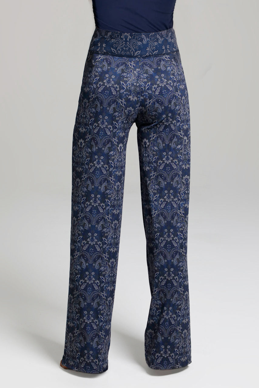Navy blue pants with floral pattern on a white background