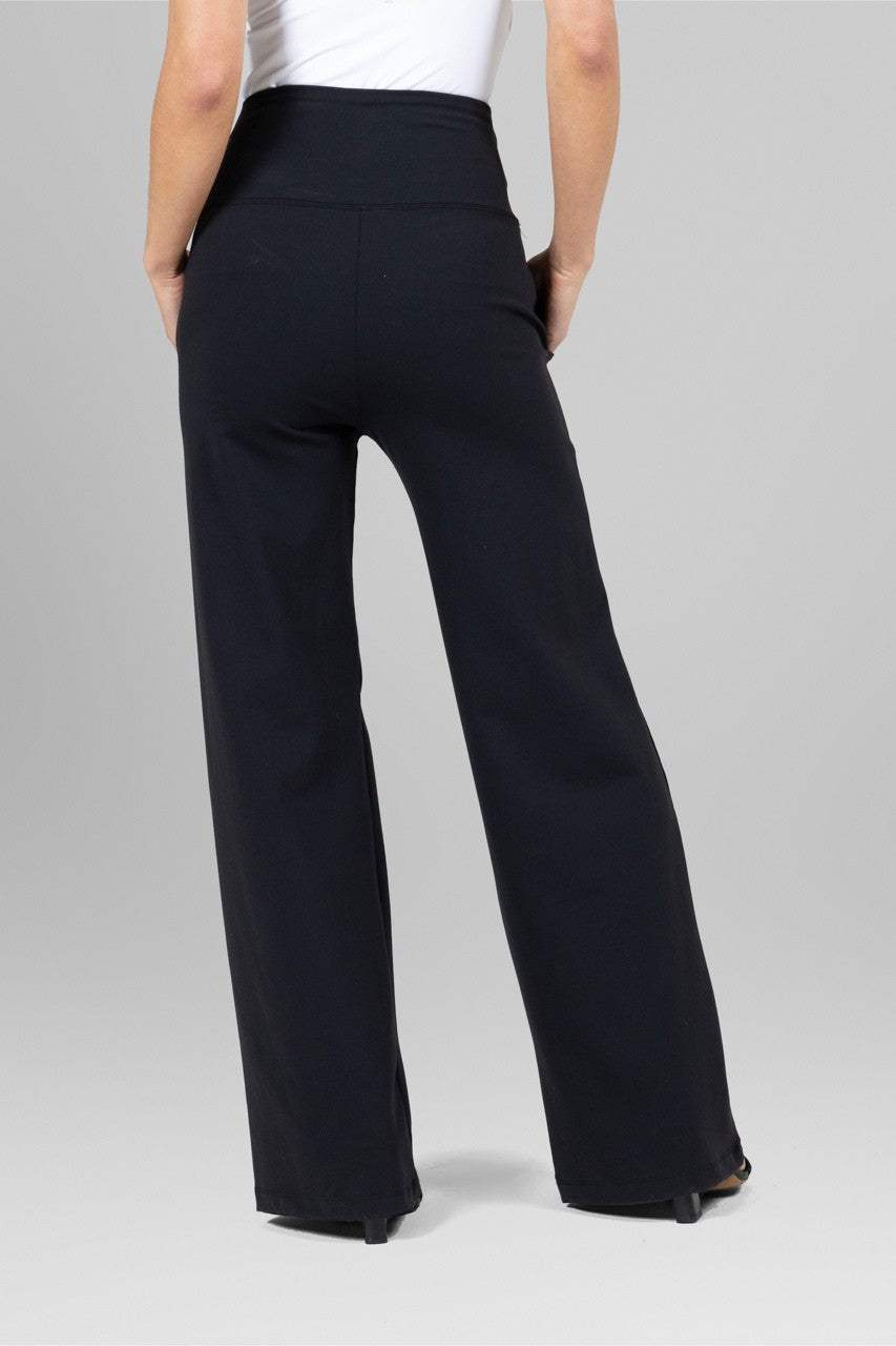 Black wide-leg pants worn by a person on a gray background