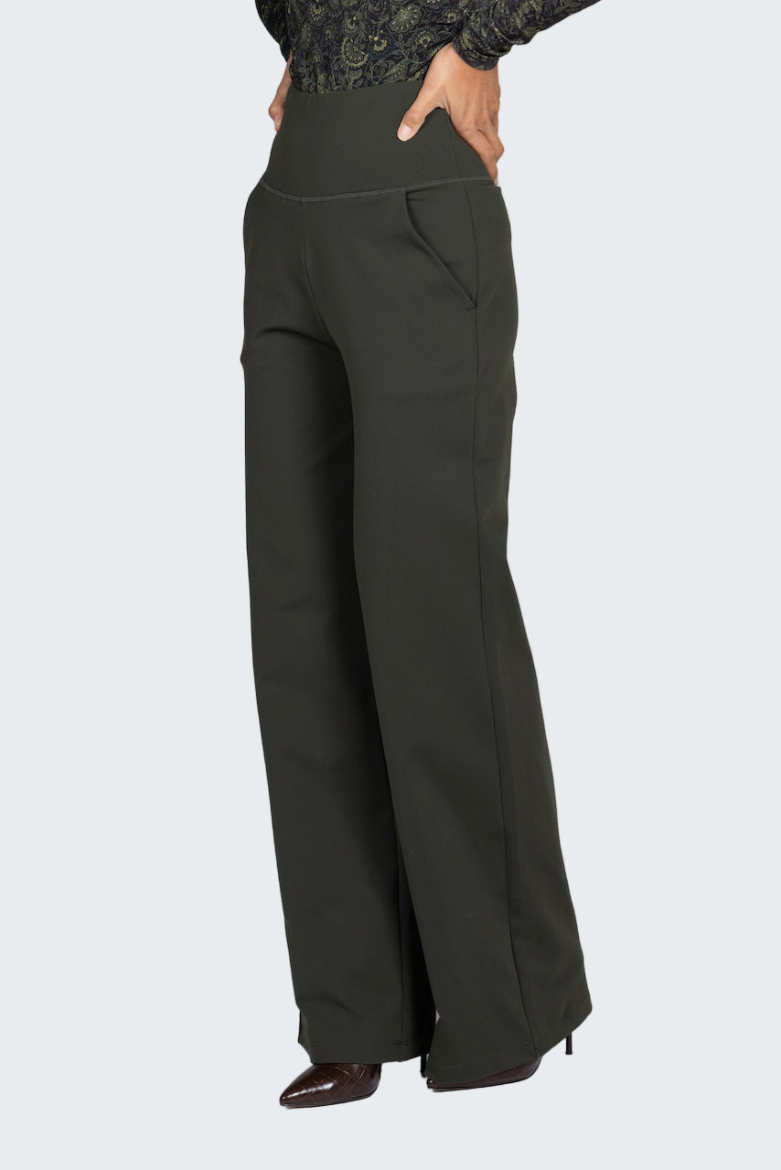 Dark green wide-leg pants worn by a person on a white background