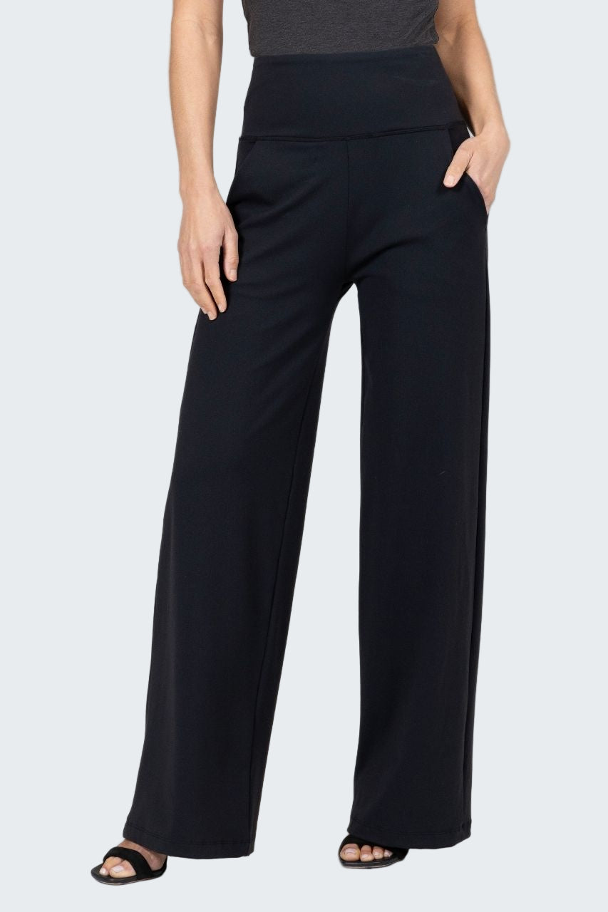 Black wide-leg pants worn by a person on a plain background