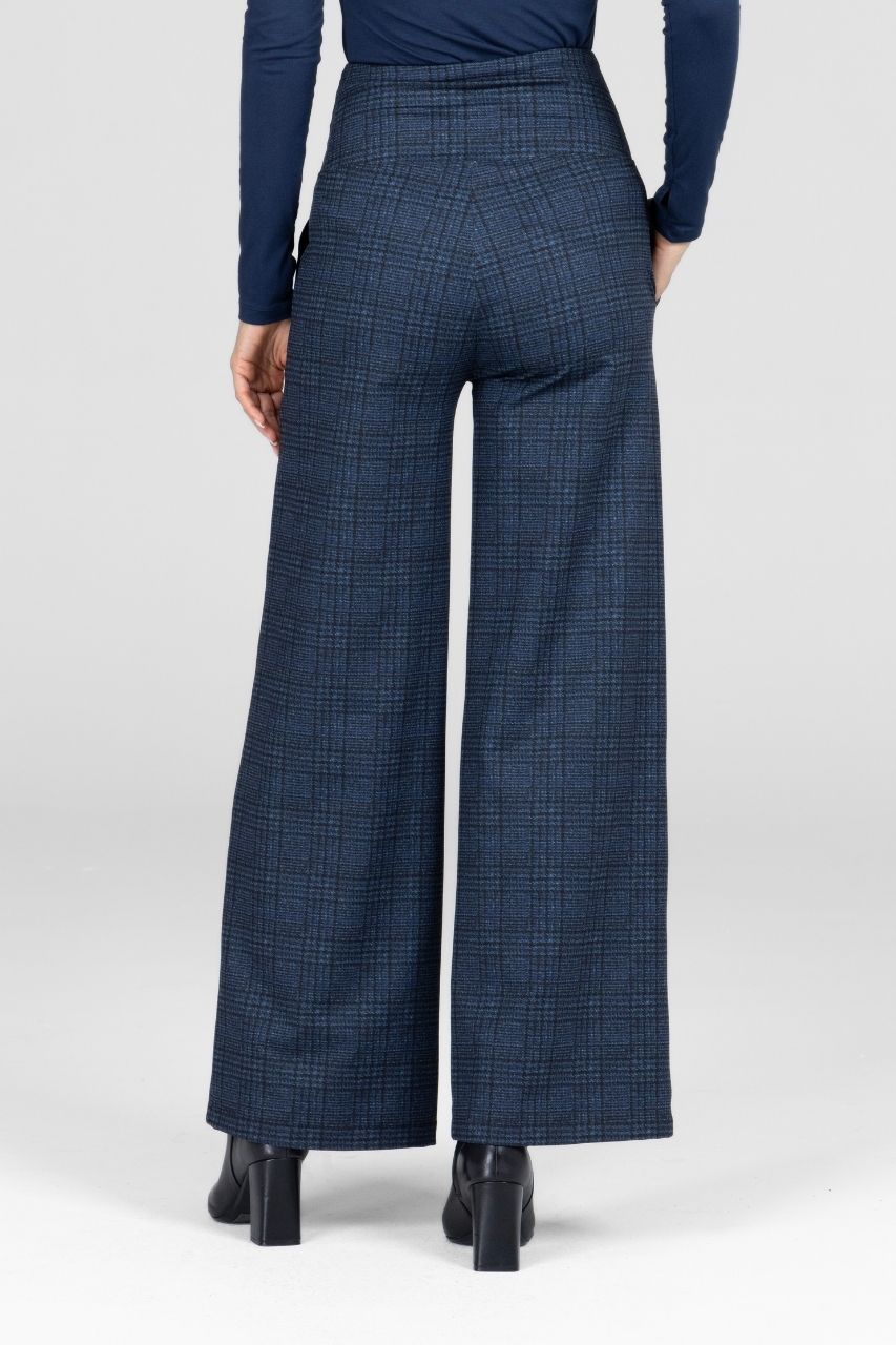 Blue checkered wide-leg pants worn by a person on a white background