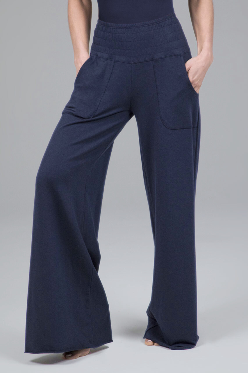 Navy blue wide-leg pants on a gray background
